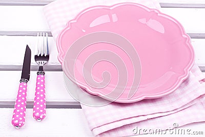Empty plate , knife and fork