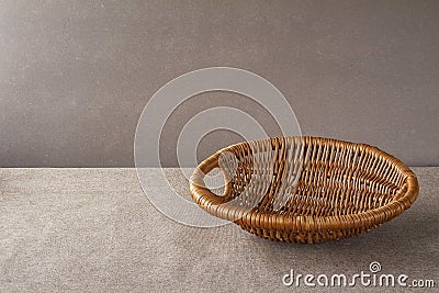 Empty wicker wooden basket grunge background