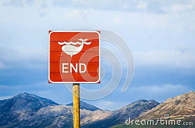 End of whales road sign