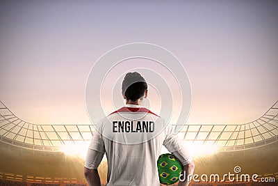 England football player holding ball