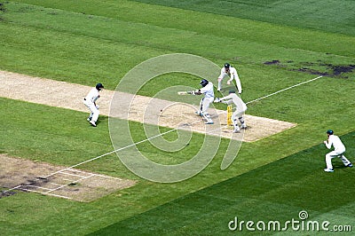 English batsman drives a ball in MCG