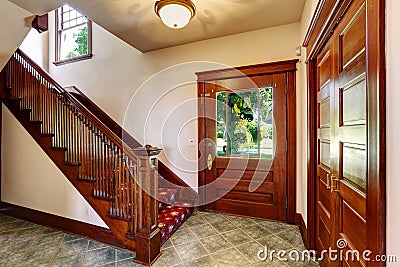 Entrance hallway with wooden staircase