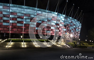 Entrance to National Stadium in Warsaw at night.