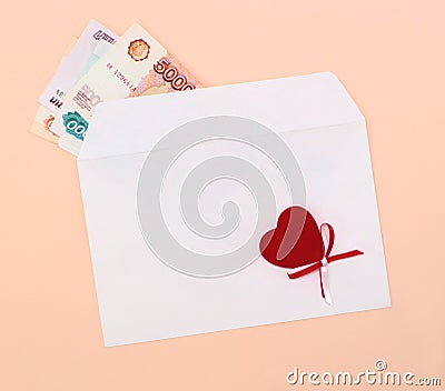 Envelope with money and heart