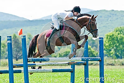 Equestrian sport. female rider show jumps