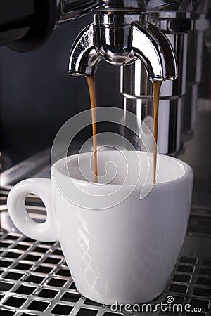 Espresso being drawn out of a espresso machine