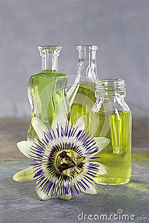 Essential oil bottles with a passion flower