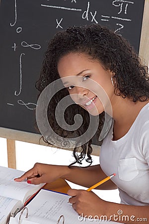Ethnic black college student studying math exam