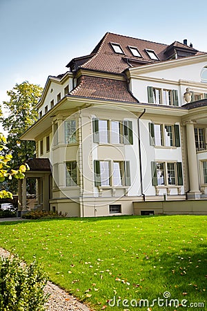 European house with green lawn