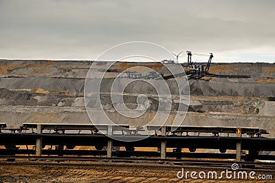 Excavator and conveyor belt