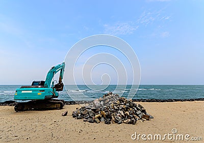 Excavator Machine Moves with Raised Bucket