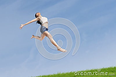 Excited woman jumping highly