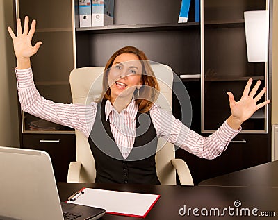 Excited Woman in office