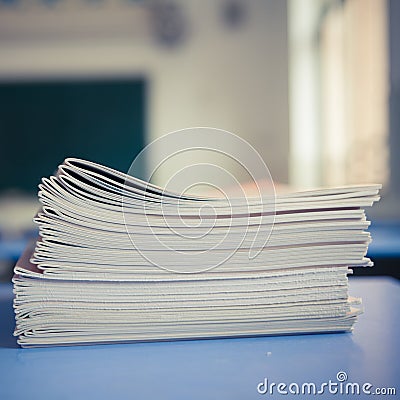 The exercise books on the desk