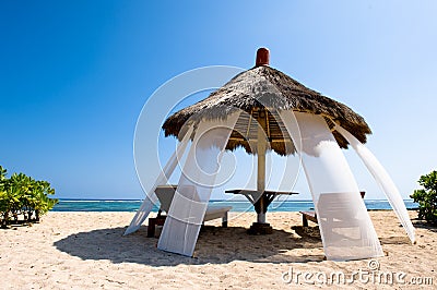 Exotic hut on tropical beach