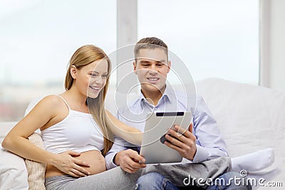 Expecting family with tablet pc computer