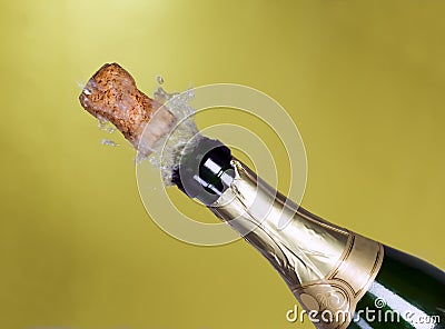 Explosion of green champagne bottle cork