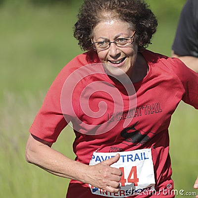 Expressive elderly runner.