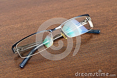 Eye glasses on desk
