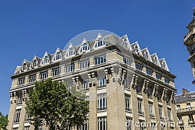 Facade of a traditional living building in Paris