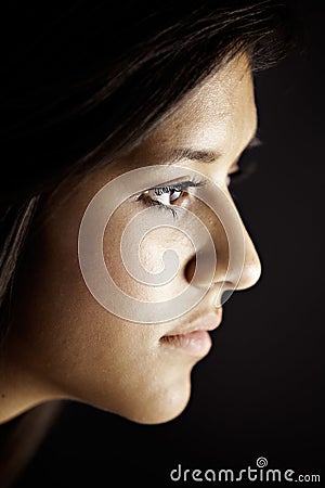 Face Side View of Teenage Female Girl on Black