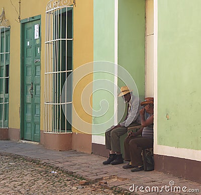 Faces Of Cuba Men In Doorway In Trinidad