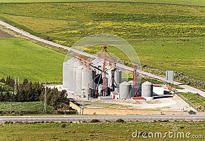 Factory farm with silo