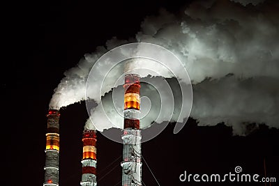 Factory pipes with white steam