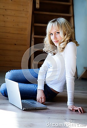 Fair-haired girl with the computer