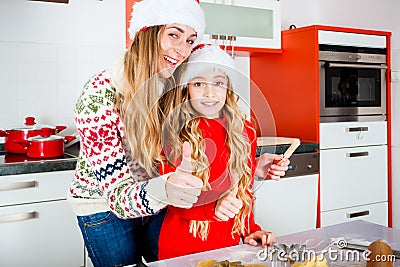Family baking Christmas cookies in kitchen