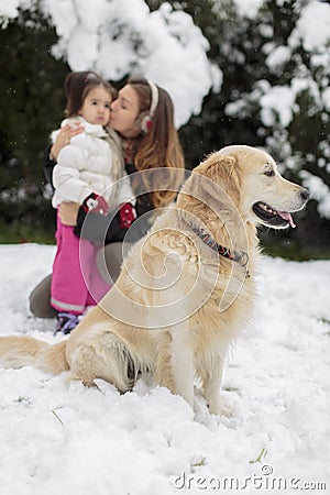 Family with a dog at winter