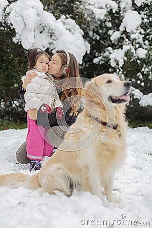 Family with a dog at winter