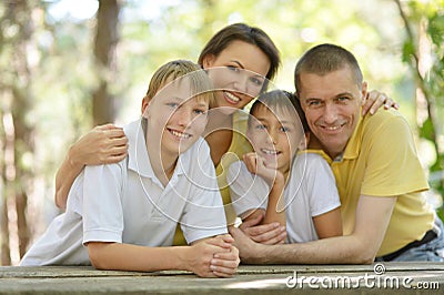 Family of four resting