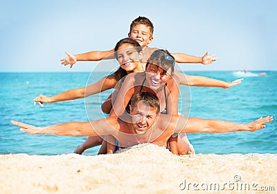 Family Having Fun at the Beach