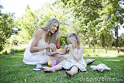 Family having picnic in summer park