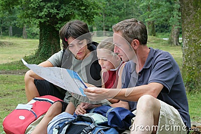 Family looking at hiking map