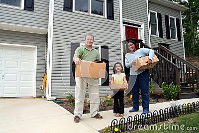 A Family Moving Into New House