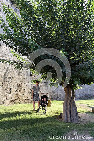 Family near tree in castle