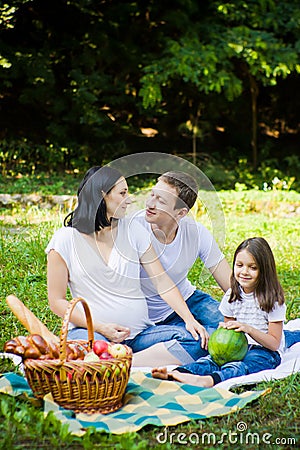 Family picnic at a meadow