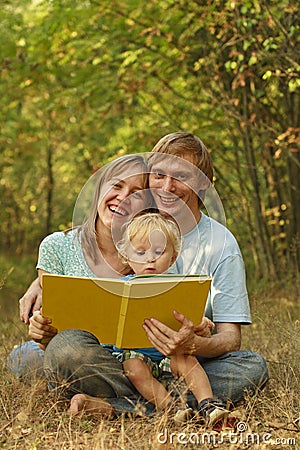 Family reading in nature