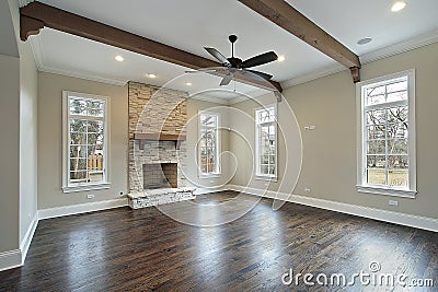 Family room with ceiling wood beams