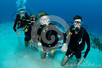 Family of scuba divers