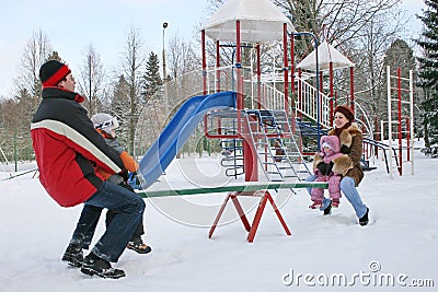 Family on seesaw