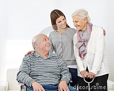 Family with senior couple at home