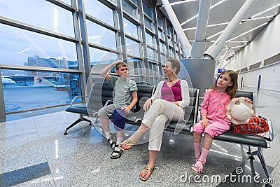 A family sitting in a recreation area