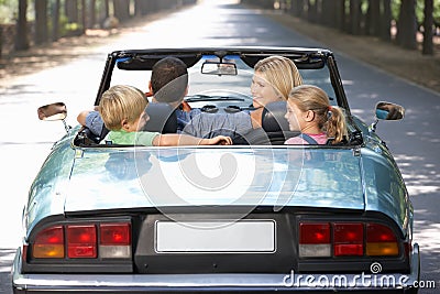 Family in sports car