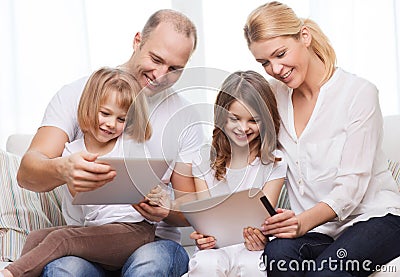 Family and two kids with tablet pc computers