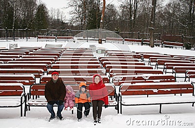 Family on winter bench