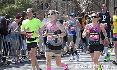 Fans cheer runners in Boston Marathon 2014