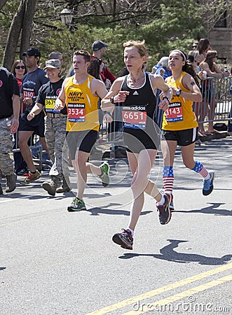 Fans cheer runners in Boston Marathon 2014